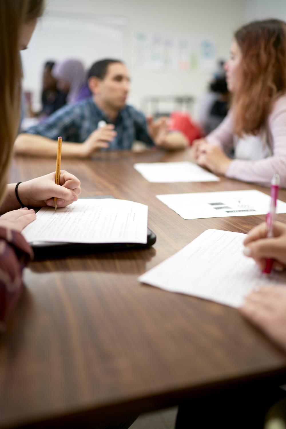 Taking notes on desk